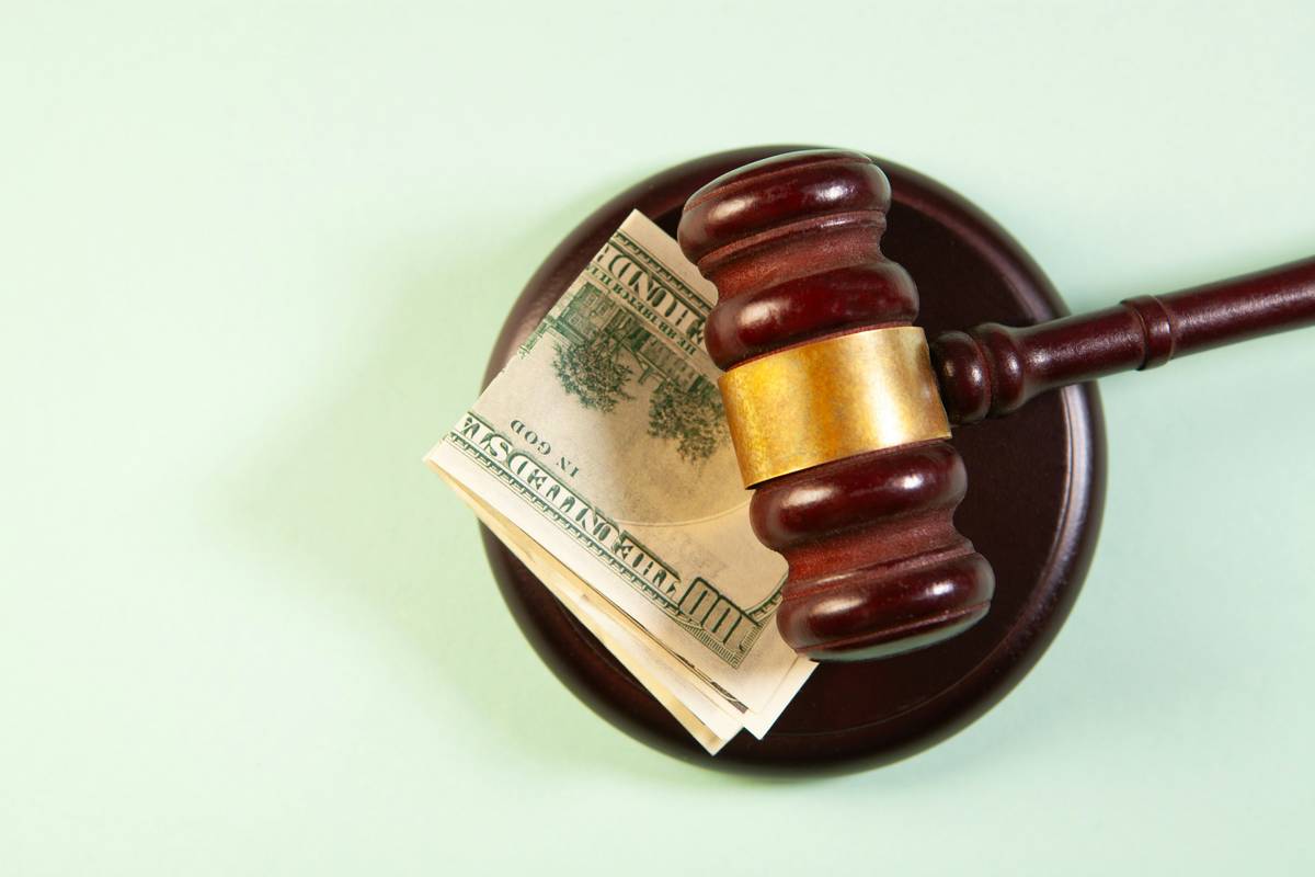 auction basic what to ask an estate auction clerk reviewing a bidder registration form with checklist in hand
